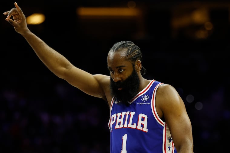 Sixers guard James Harden raises his arm against the Cleveland Cavaliers on Friday, March 4, 2022 in Philadelphia.