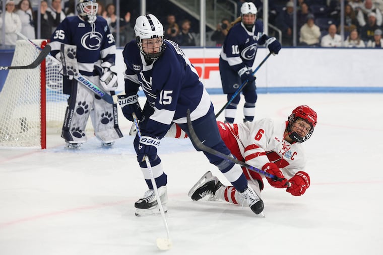 Penn State's Tessa Janecke (15) capped a historic career against Lacey Eden's Wisconsin squad in the Frozen Four.