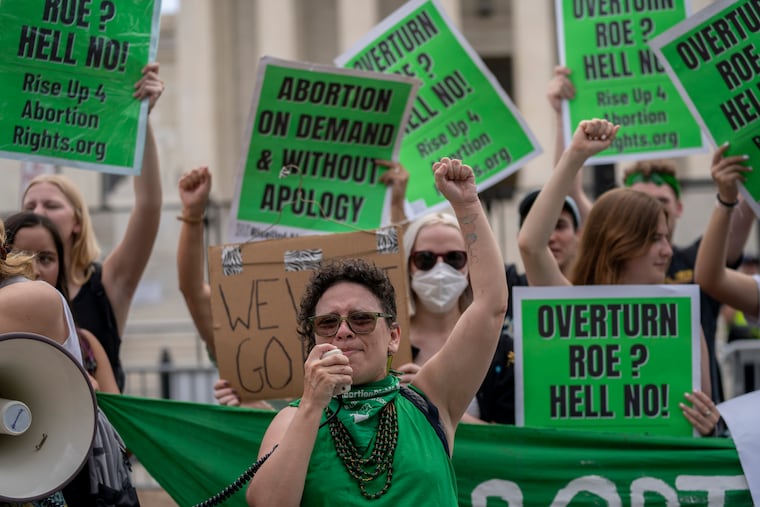 Abortion-rights protesters regroup and protest following Supreme Court's decision to overturn Roe v. Wade, federally protected right to abortion, in Washington, Friday, June 24, 2022. The Supreme Court has ended constitutional protections for abortion that had been in place nearly 50 years, a decision by its conservative majority to overturn the court's landmark abortion cases.
