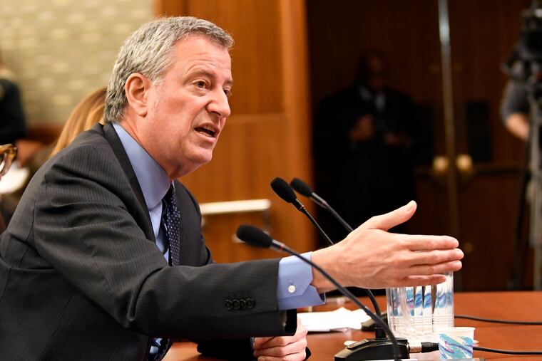New York City Mayor Bill de Blasio testifies during a joint legislative budget hearing on local government Monday, Feb. 11, 2019, in Albany, N.Y. De Blasio acted very much like a White House candidate during his weekend visit to Iowa that starts the presidential nominating process, meeting with Democrats and pitching a populist message.