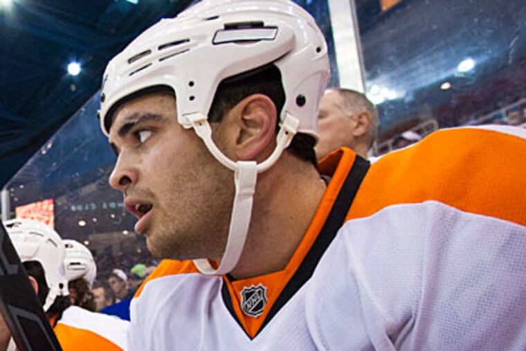 Flyers forward Tom Sestito (above) and Ben Holmstrom were sent back to the Phantoms. (Tony Ding/AP)
