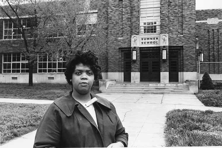 Linda Brown Smith is shown in front of the Sumner School in Topeka, Kansas, in 1964. The refusal of the school to admit Brown in 1951, when she was nine years old, because she was black, led to the Brown v. Board of Education of Topeka, Kansas.