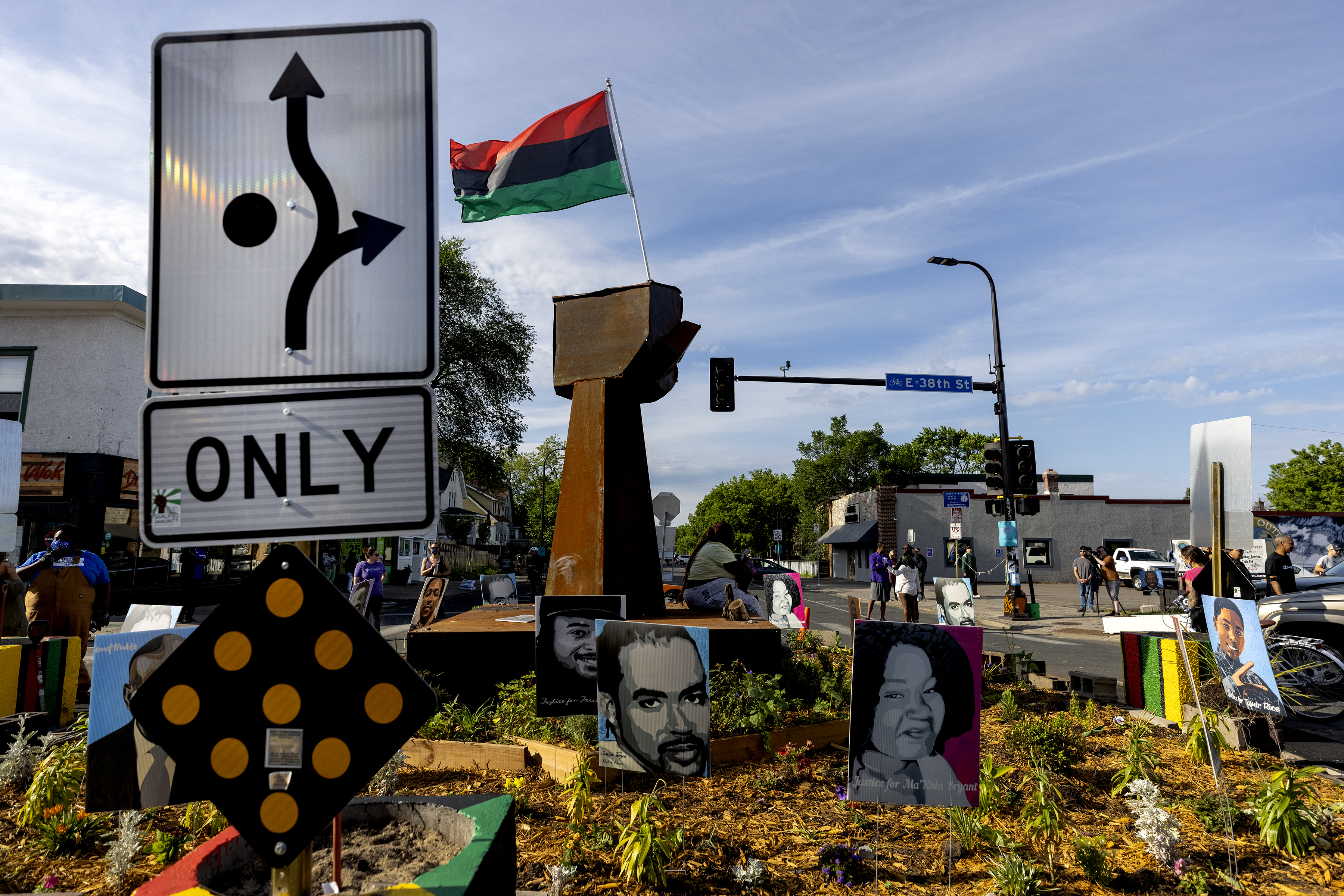 A traffic sign signaled directions around the monument at George Floyd Square.