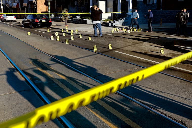 The scene at Lansdowne Avenue and North Frazier Street Monday after gunfire injured three teenage boys.
