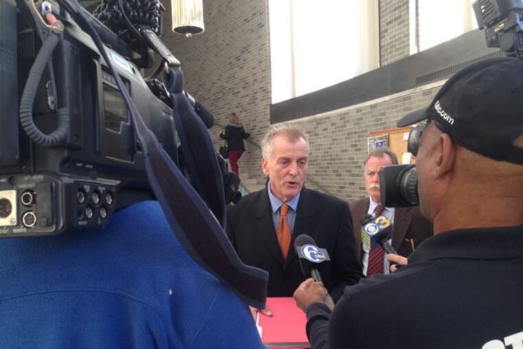 Don Tollefson speaks to the media before entering court for jury selection. (Ben Finley / Staff)