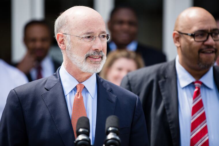 Gov. Tom Wolf (left) and Corrections Secretary John Wetzel. Both resist the use of reprieve to reduce the prison population in response to rising coronavirus deaths.
