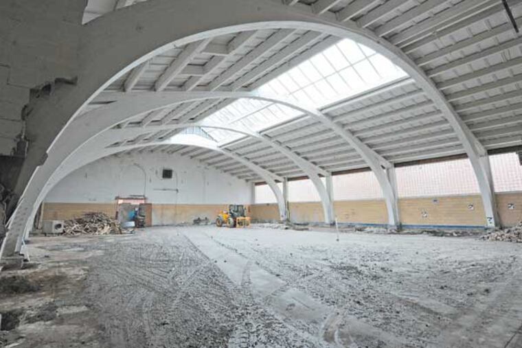 In Philadelphia, a 72-year-old recreational facility at the Navy Yard that will be converted into energy-efficient offices for the EEB Hub, photographed on 4/18/13. Here, an interior. ( APRIL SAUL / Staff )