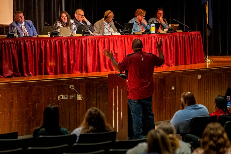 Jarrell Brazzle, 36, speaks in support of Audra Ritter, a suspended seventh-grade special education and English language arts teacher at North Brandywine Middle School, during a May 24 meeting of the Coatesville Area School Board. The school board this week voted to fire Ritter for taping a message to a student's face.