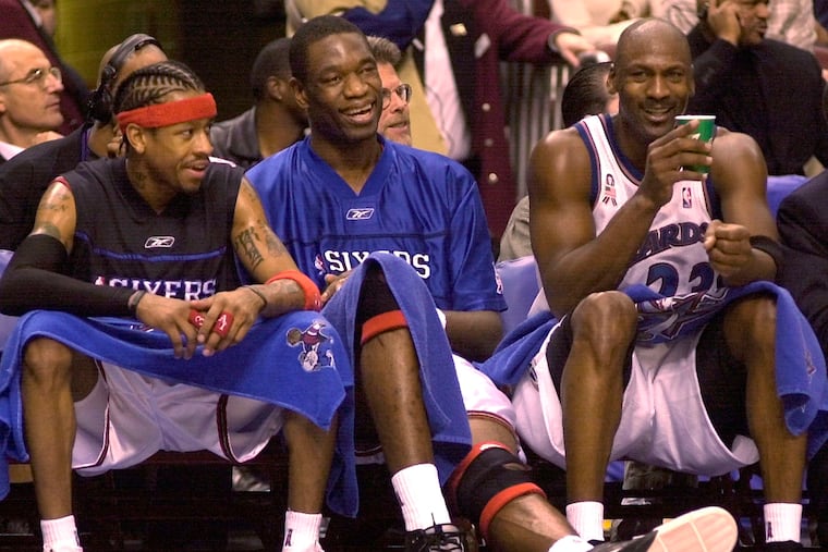 From left, Allen Iverson and Dikembe Mutombo talk with Michael Jordan during the 2002 NBA All-Star Game in Philadelphia.