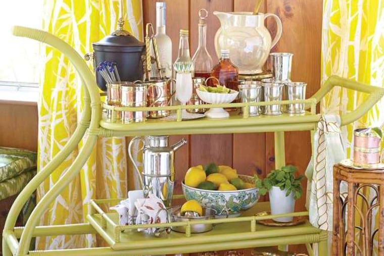 A bar cart should be stocked with a pitcher or a jug, an ice bucket, stirring spoon, cocktail shaker, and glasses to serve drinks.