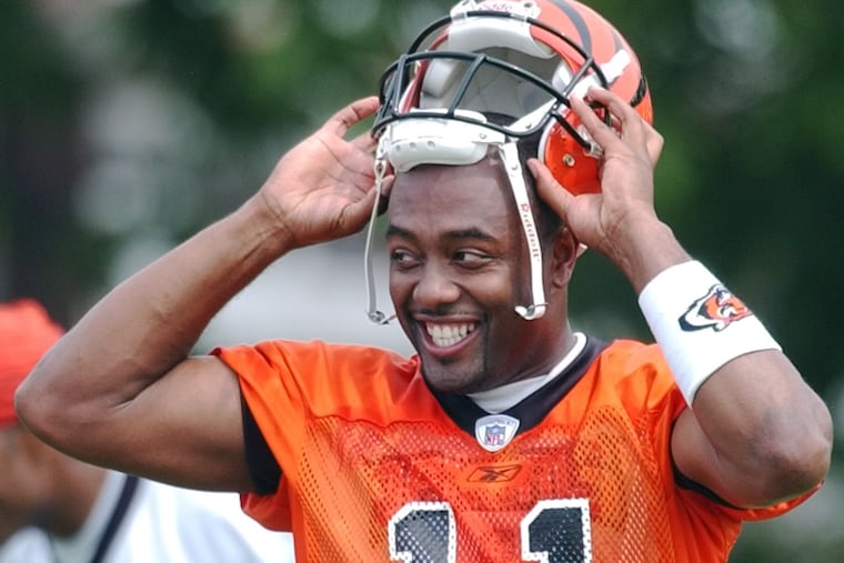 Cincinnati Bengals quarterback Akili Smith smiles during practice in 2002 at training camp.