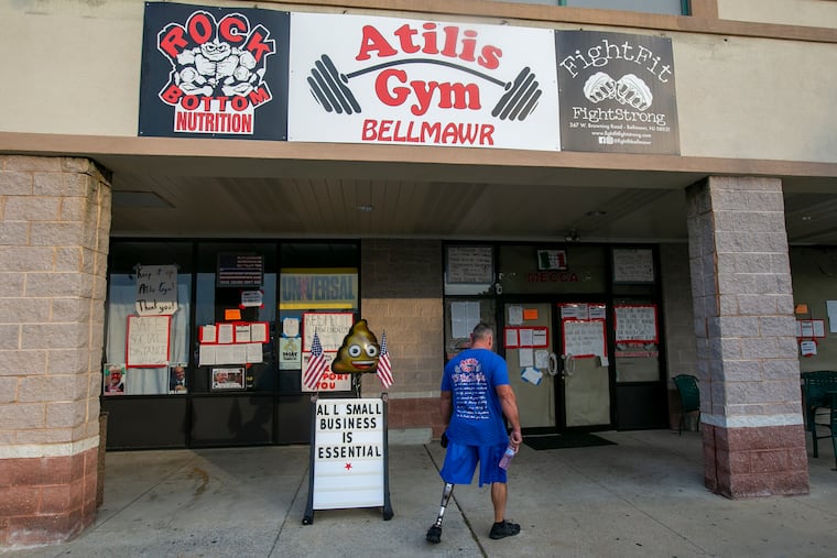 Patrons enter Atilis Gym. Business as usual at Atilis Gym in Bellmawr, N.J., on Aug. 12, 2020.