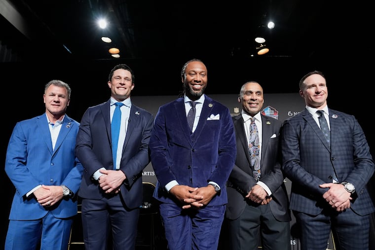 Adam Vinatieri (from left) stands with Luke Kuechly, Larry Fitzgerald, Roger Craig and Drew Brees after being announced for the Pro Football Hall of Fame class of 2026 during football's NFL Honors award show in San Francisco on Thursday.