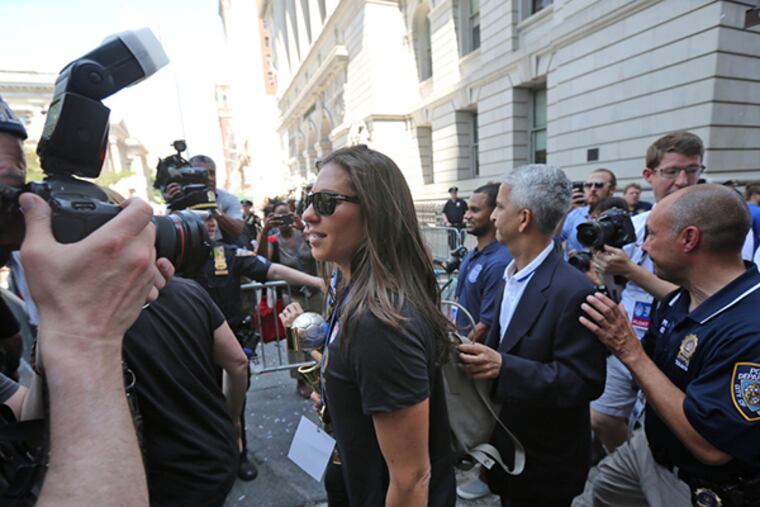 Carli Lloyd, Mayor Bill de Blasio, and the rest of the U.S. Women's National Team parade through New York City's Canyon Of Heroes Friday, July 10, 2015.