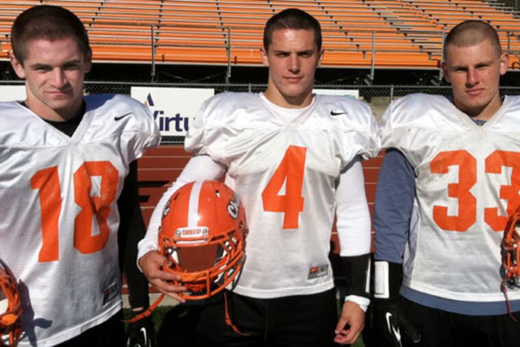 Cherokee football players (from left) Rob Agnoni, Matt Stickney, and Anthony Gambone. (PHIL ANASTASIA / Staff)