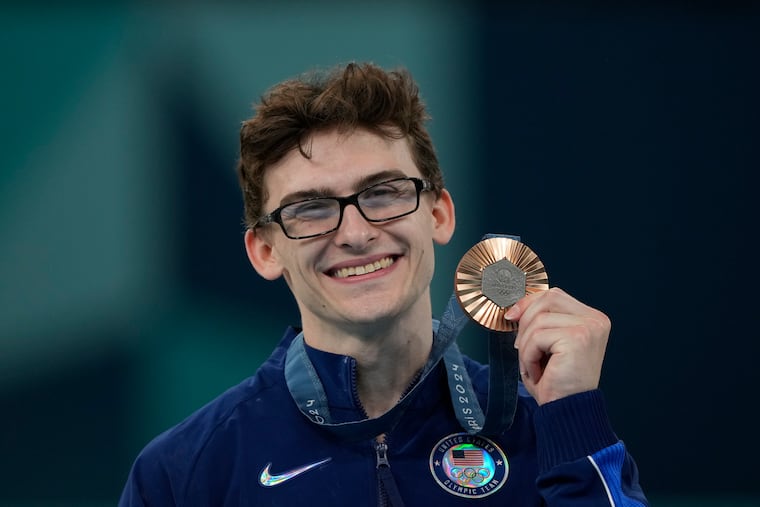 Stephen Nedoroscik, of the United States, celebrates after winning the bronze medal during the men's artistic gymnastics individual pommel finals at Bercy Arena at the 2024 Summer Olympics.