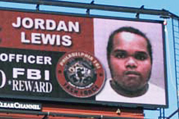 An electronic billboard in Philadelphia featured John "Jordan" Lewis, later sentenced to death in the killing of Police Officer Charles Cassidy.