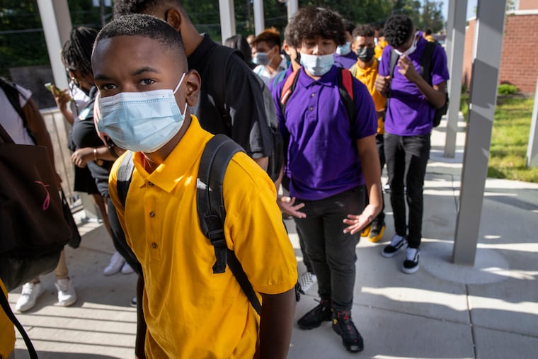 In this file photo, Richard Coleman Jr. enters the Camden High Campus, Creative Arts High School, at 1700 Park Blvd., Camden.