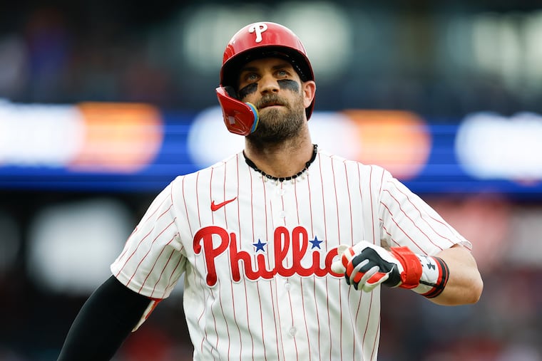 Bryce Harper reacts after flying out to end the third inning against the Toronto Blue Jays on Saturday.