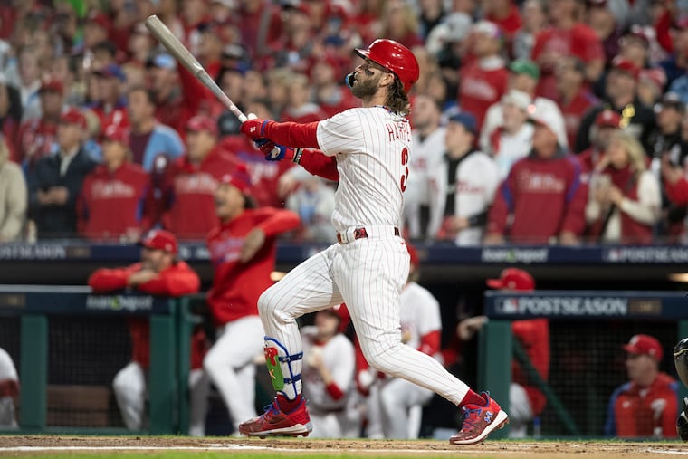 Bryce Harper launches a solo home run in the first innings of Game 1 vs. Arizona.