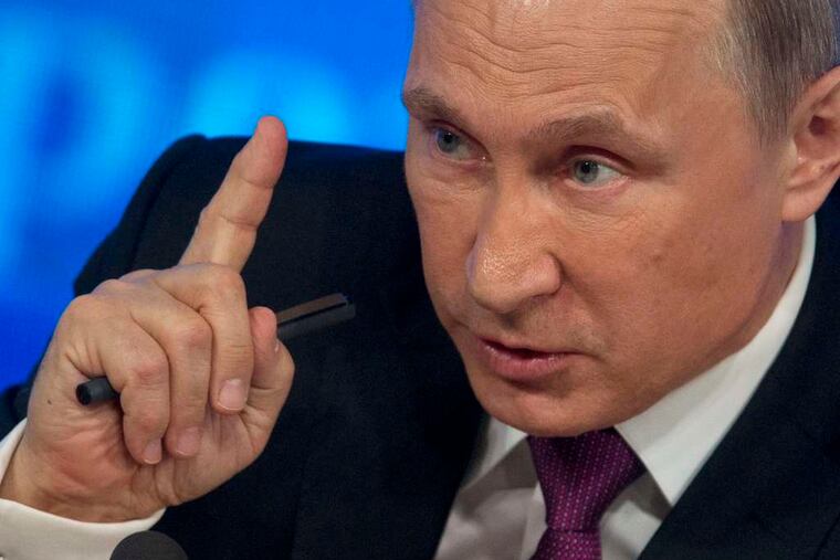 President Vladimir Putin, in his annual year-end news conference Thursday, blamed the West for much of Russia's troubles, but acknowledged that the economy is not diversified.