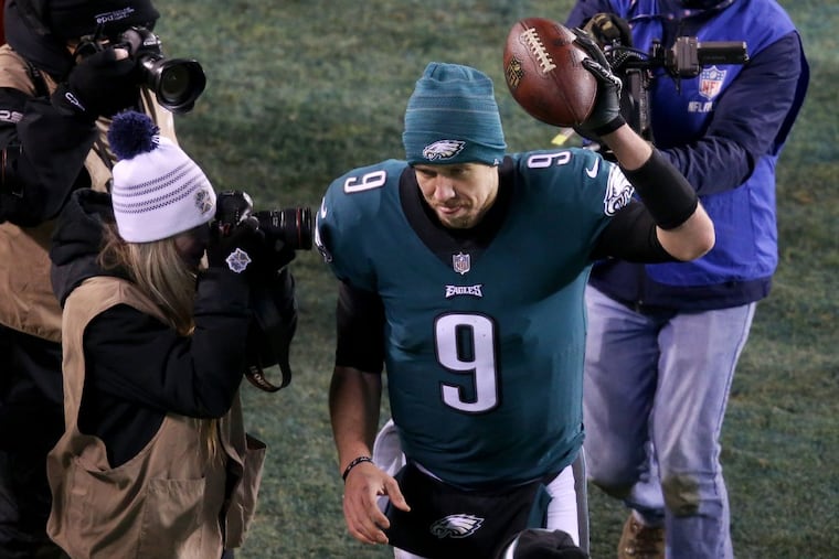 Eagles quarterback Nick Foles (9) celebrates after the victory.