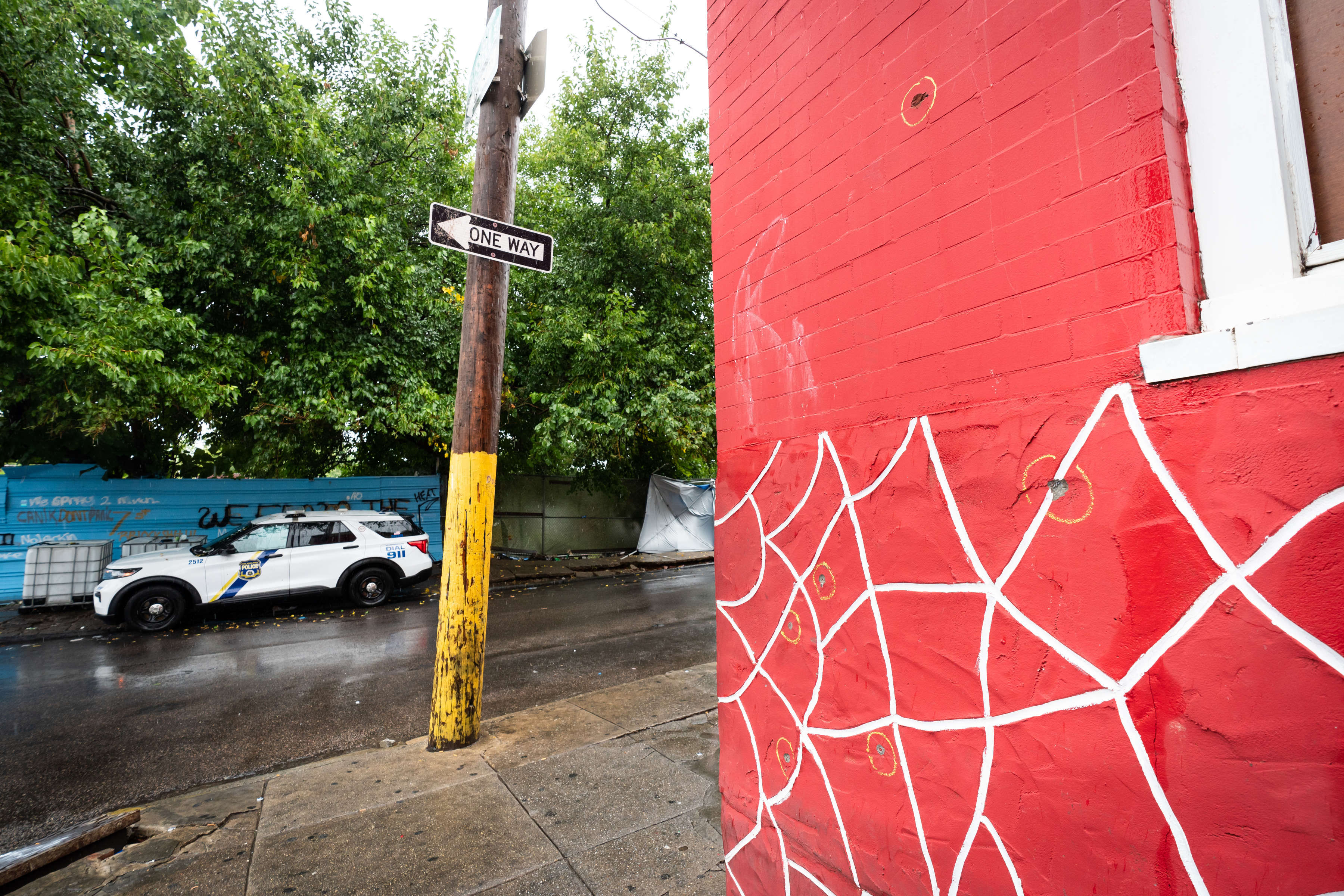 Bullet holes in the wall of a home on the 700 block of West Russell Street, in Philadelphia. Six people were shot there around 1 a.m. on Monday.