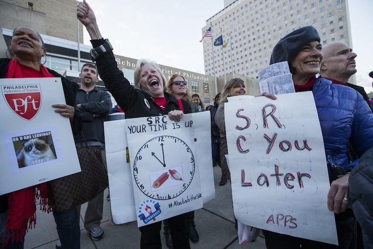 Diane Payne, center, a retired teacher from Mayfair Elementary, and others rallied outside the School District of Philadelphia building on Nov. 16, 2017.