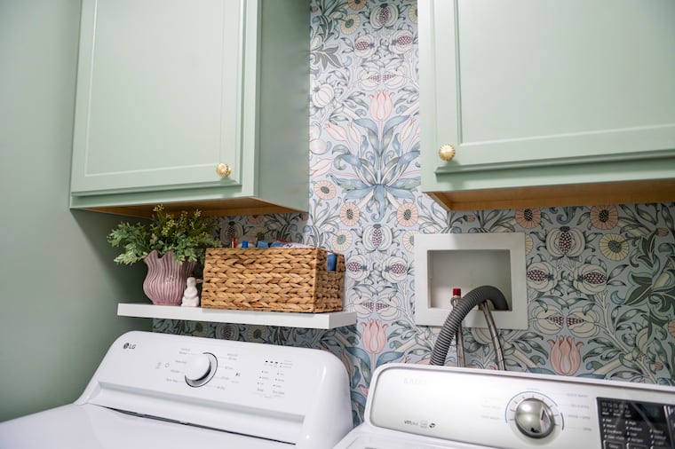 Caroccio added floral wall paper to the laundry room.