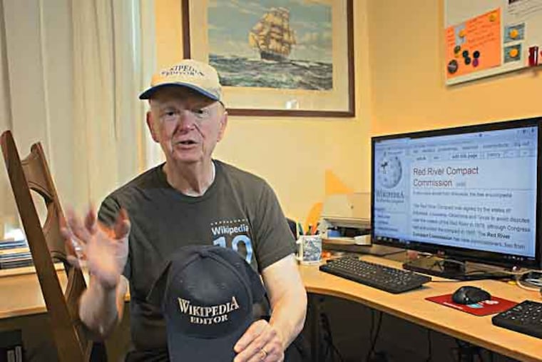 74-year-old David Thomsen, a WIkipedia editor who has spent the past 5 years totally engrossed in his hobby, spending as much as 10 hours a day at his computer editing Wikipedia copy, stories and photos. Thomsen, who lives in the Fairmount section of the city, often works wearing his Wikipedia hats, which he has made and gives to other editors. (ED HILLE / Staff Photographer)