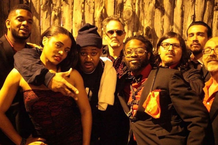 Ghostface Killah (third from left), next to Adrian Younge and his band, Venice Dawn, after their first performance together.