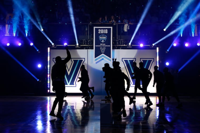 Villanova mens basketball team members runs off the court after unveiling the 2018 NCAA National Championship banner during the Hoops Mania in the Finneran Pavilion during on Friday, October 5, 2018.