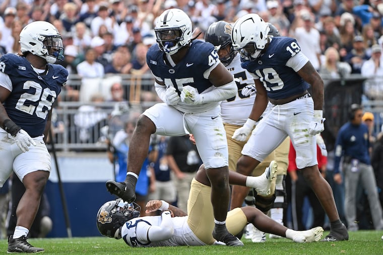 Penn State's Enai White (45), a former Imhotep star, celebrates after sacking Florida International quarterback Keyone Jenkins on Saturday.
