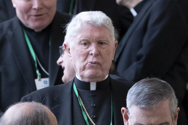 Bishops descend the escalator for a lunch break Tuesday during the second day of the U.S. Conference of Catholic Bishops fall meeting in Baltimore.