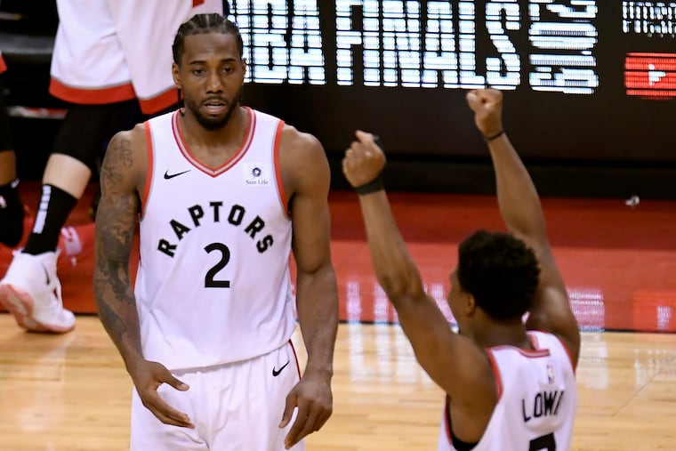 Kawhi Leonard (left) and Kyle Lowry have Toronto in the NBA Finals for the first time.