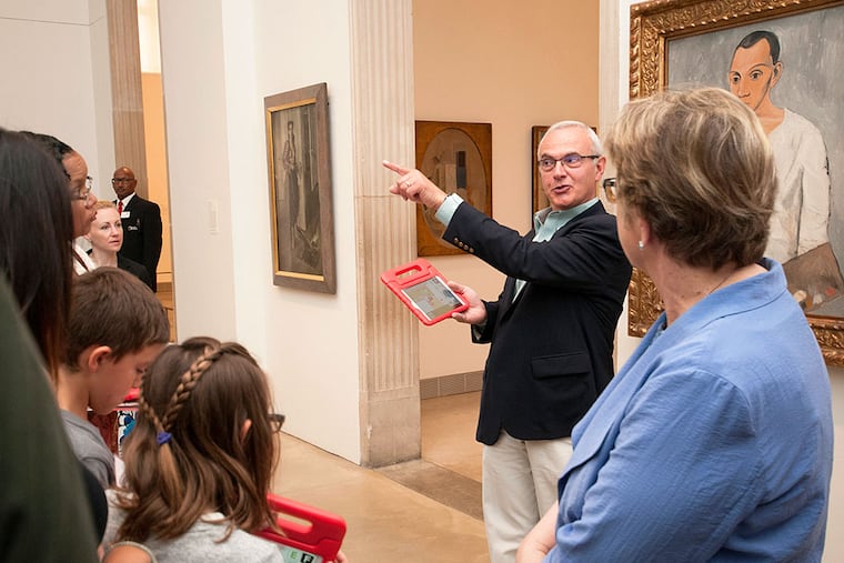 The Art Museum's Ariel Schwartz leads an "Art Splash" tour using a new art-finding app. GRAYDON WOOD / Philadelphia Museum of Art
