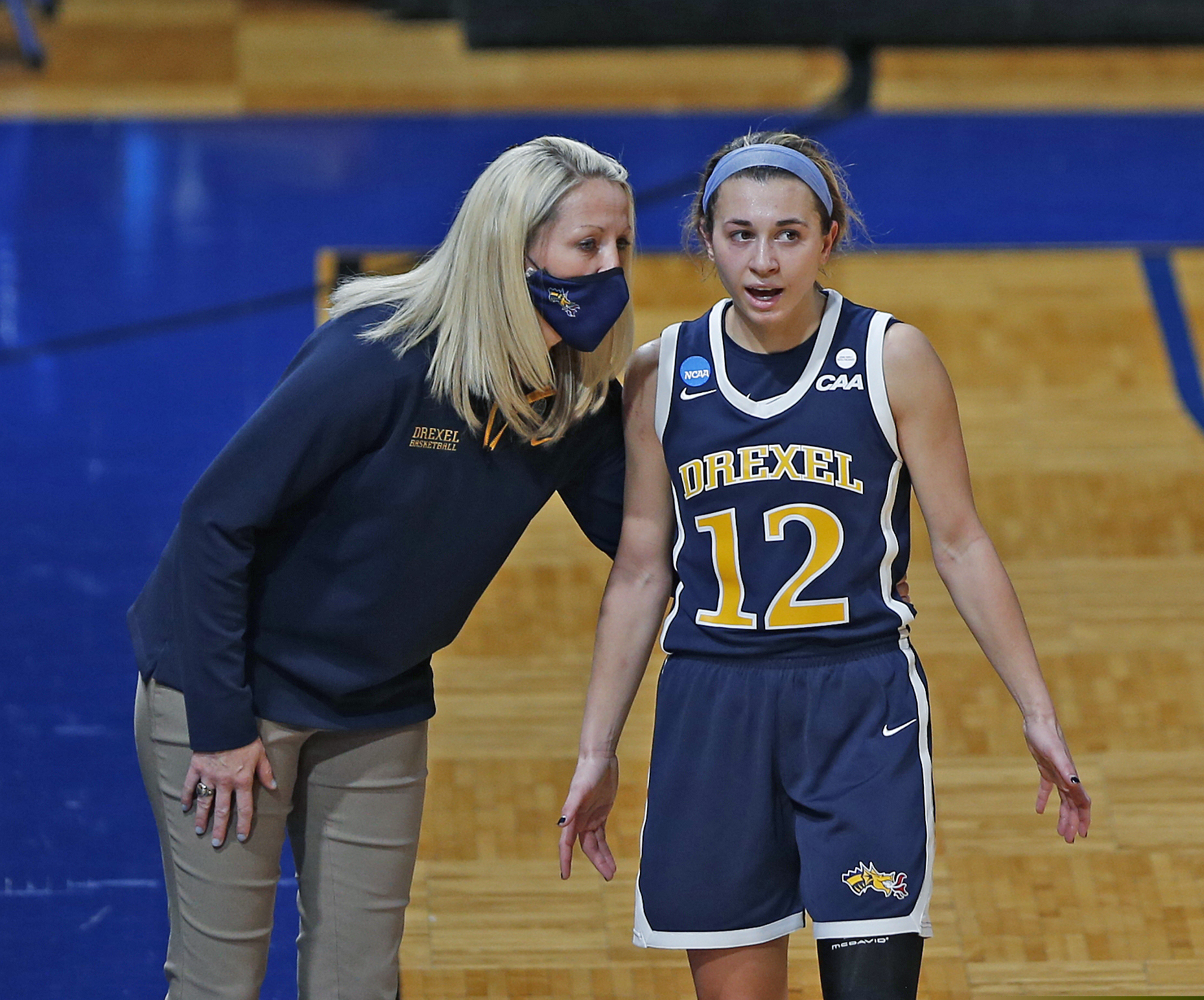 Drexel coach Amy Mallon talks with Dragons guard Hannah Nihill during Monday's NCAA game.