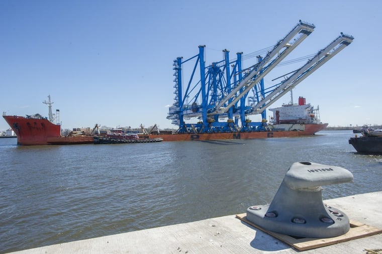 The ship Zhen Hua 16 carrying PhilaPort’s two giant cranes prepares to dock at the Packer Avenue Terminal in South Philadelphia.