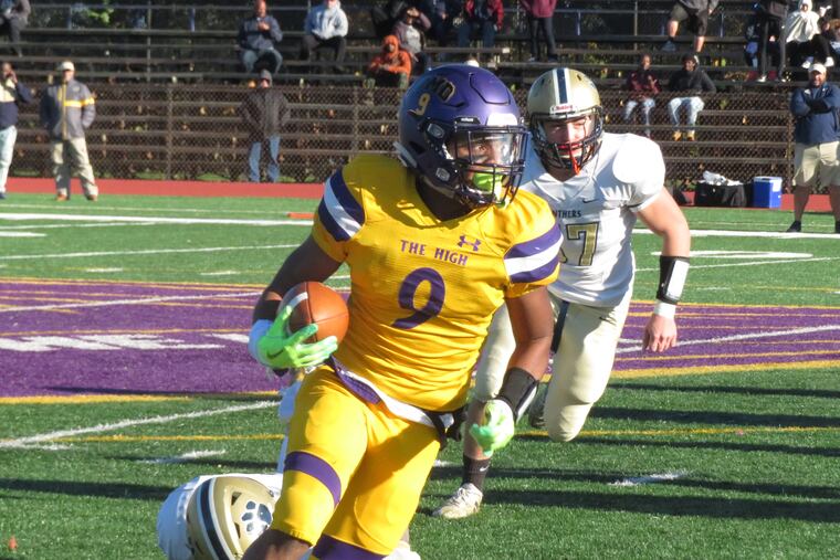 Camden's Brian Whitmore runs for a big gain in Saturday's 48-0 win over Collingswood in a South Jersey Group 2 playoff opener.