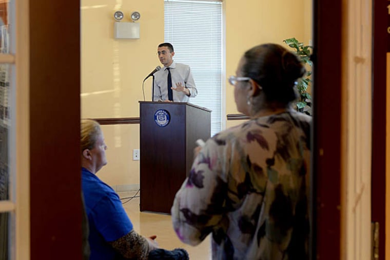 Camden Superintendent Paymon Rouhanifard meets with parents at the Baldwin's Run Community Center. "There's a clear desire for dramatic change," he says.