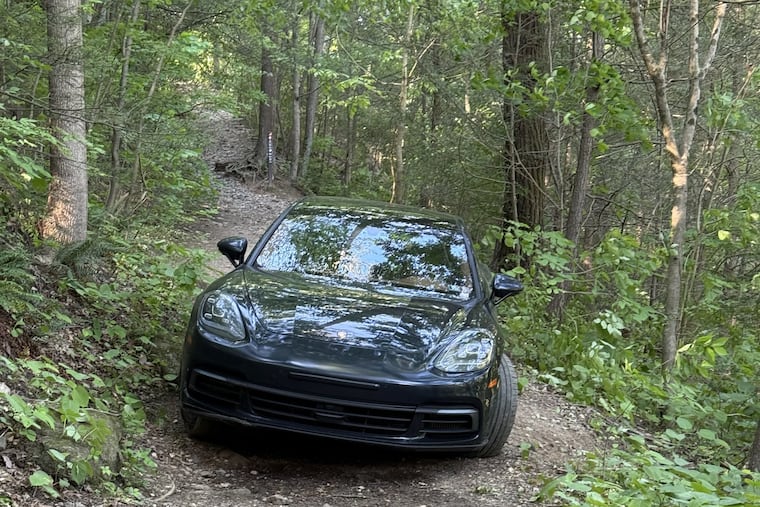 On Monday morning, hikers discovered a Porsche Panamera on the orange trail in Wissahickon Valley Park, setting of wild speculation about how it got there and whose it is.