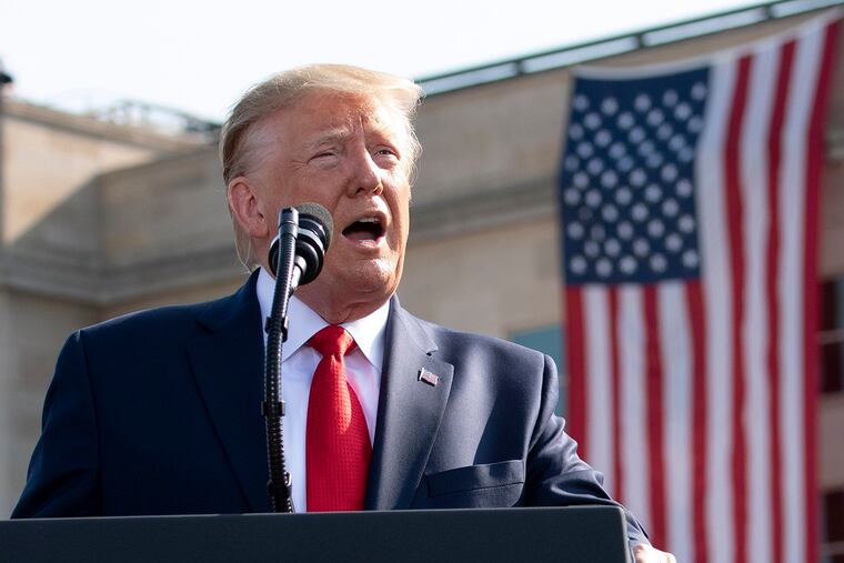President Donald Trump delivers remarks at a ceremony at the Pentagon during the 18th anniversary commemoration of the September 11 terrorist attacks.