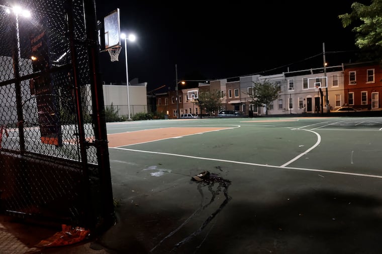 A large amount of blood at one of the crime scenes on a basketball court at the 8th and Diamond Playground in North Philadelphia on Aug. 11, 2023.
