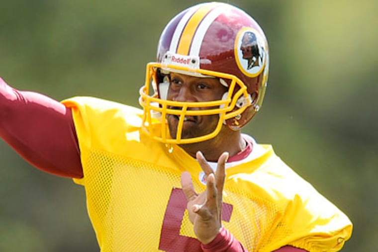 "He's a natural leader," Redskins coach Mike Shanahan said of Donovan McNabb. (Nick Wass/AP)