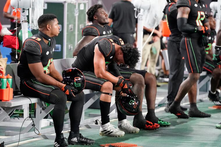 Miami players react in the final seconds of their late loss to Georgia Tech on Saturday.