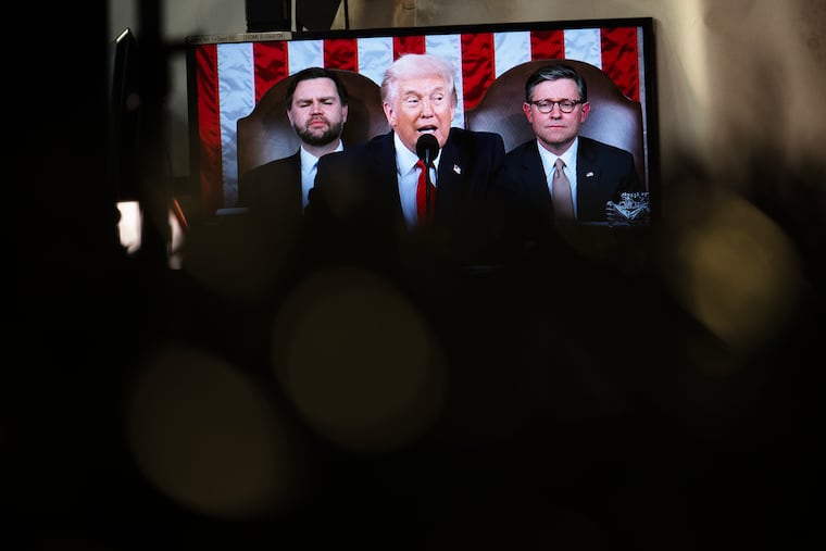 President Donald Trump’s State of the Union address is seen on a TV screen connected to media tents outside the White House on Tuesday.
