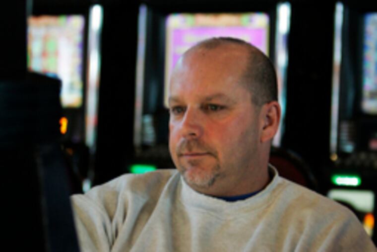 Frank Carey, of West Chester, at Harrah's in Chester. "I used to play the dollar slots," he said. "Now I'm down to the penny machines."