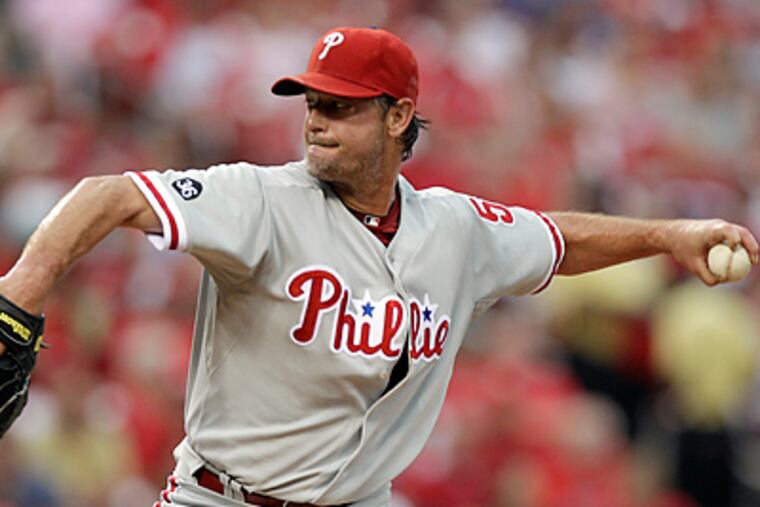 Jamie Moyer lasted only one inning, giving up two hits before leaving the game with an elbow strain. (AP Photo/Jeff Roberson)