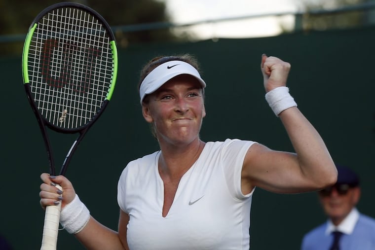 Dover, Del., native Madison Brengle celebrates after beating Richel Hogenkamp of the Netherlands in the first round at Wimbledon.