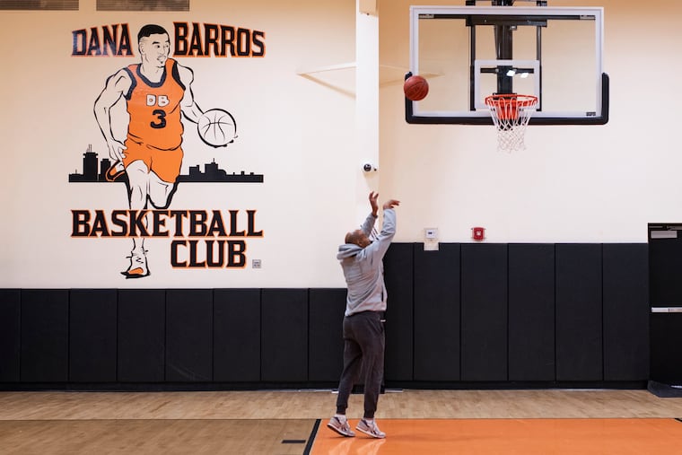 Retired Sixers guard Dana Barros shoots around at the Dana Barros Basketball Club in Stoughton, Mass.